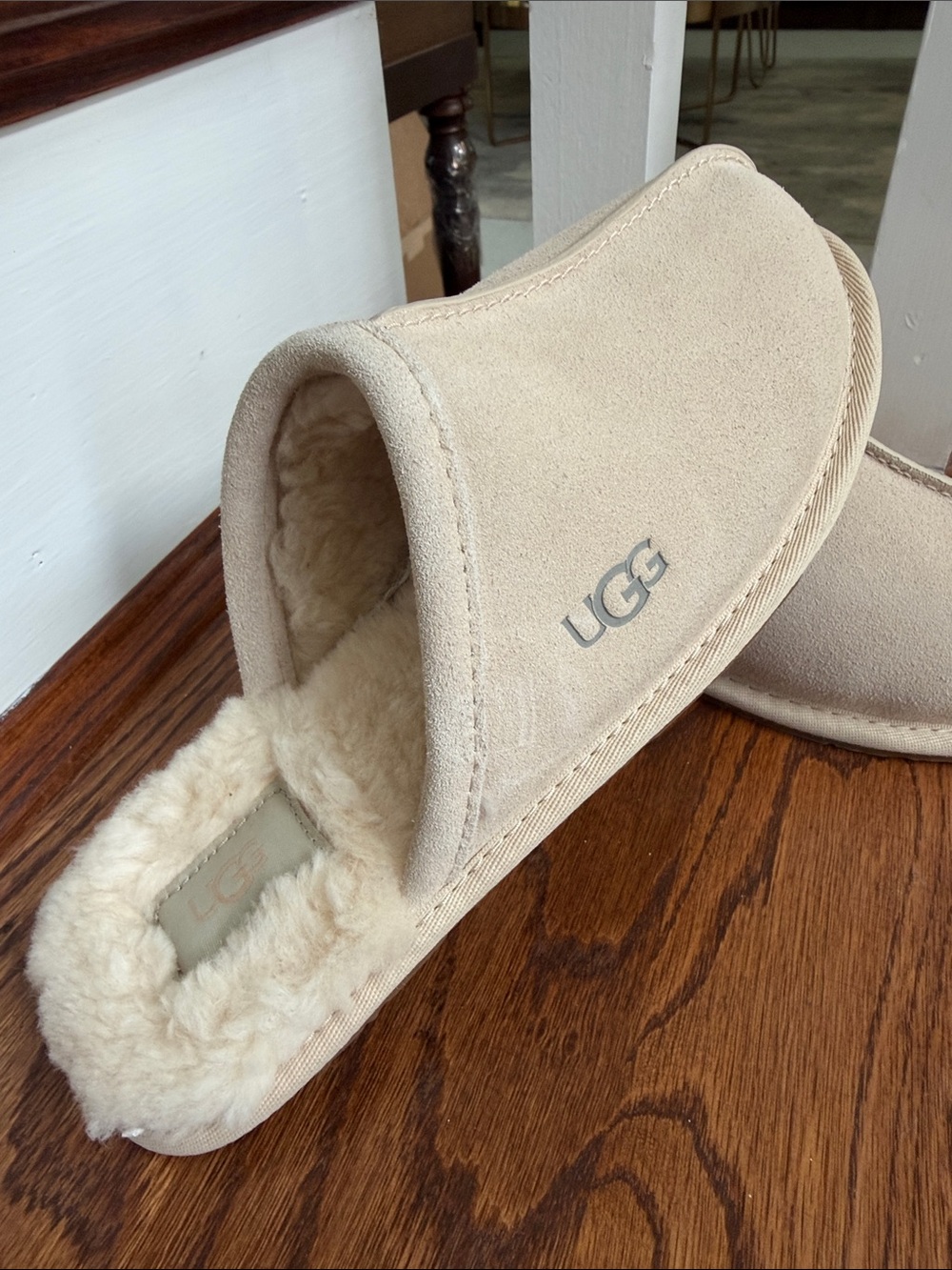 UGG Women’s Slip-On Shearling Lined Slippers in Sand